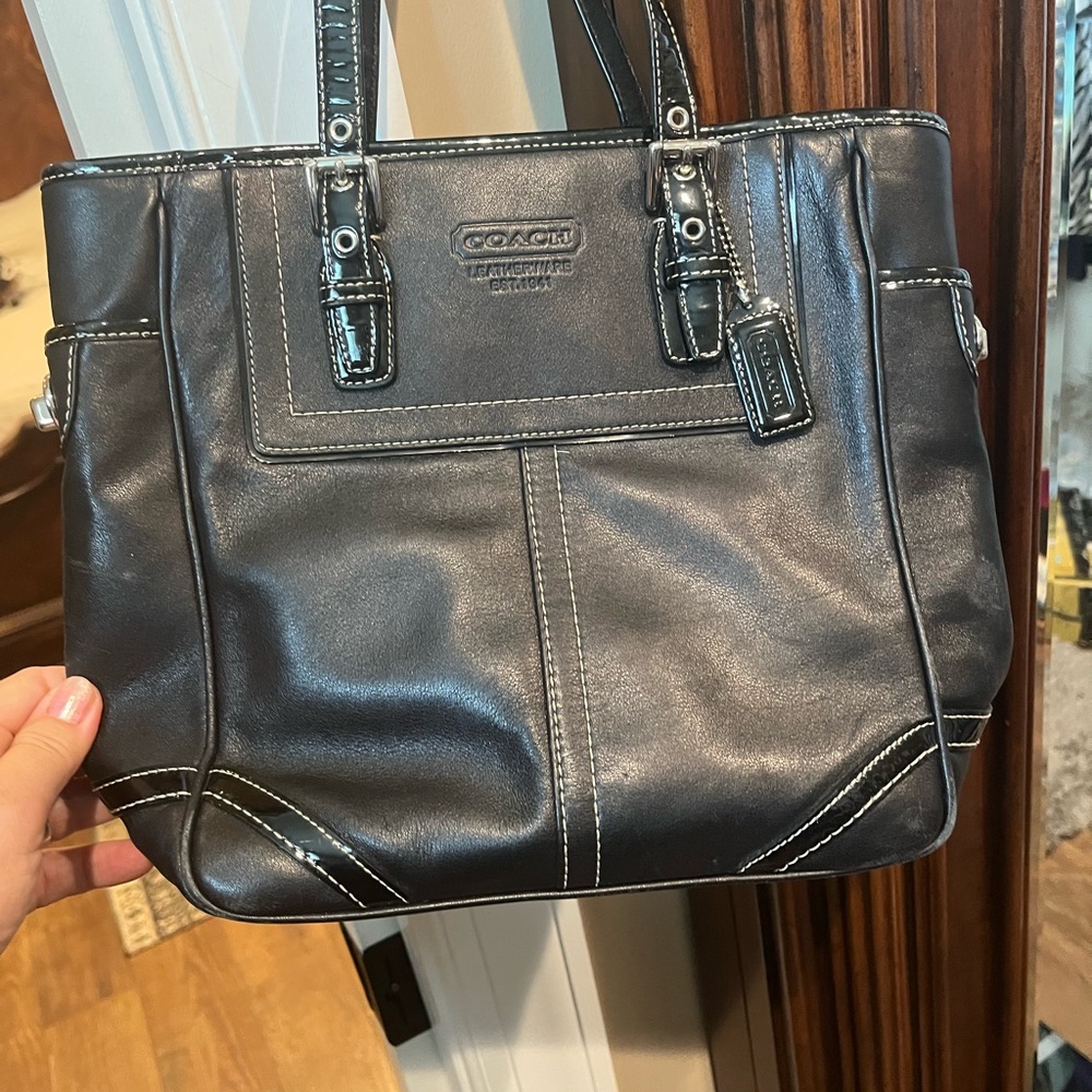 Black leather coach perfect condition